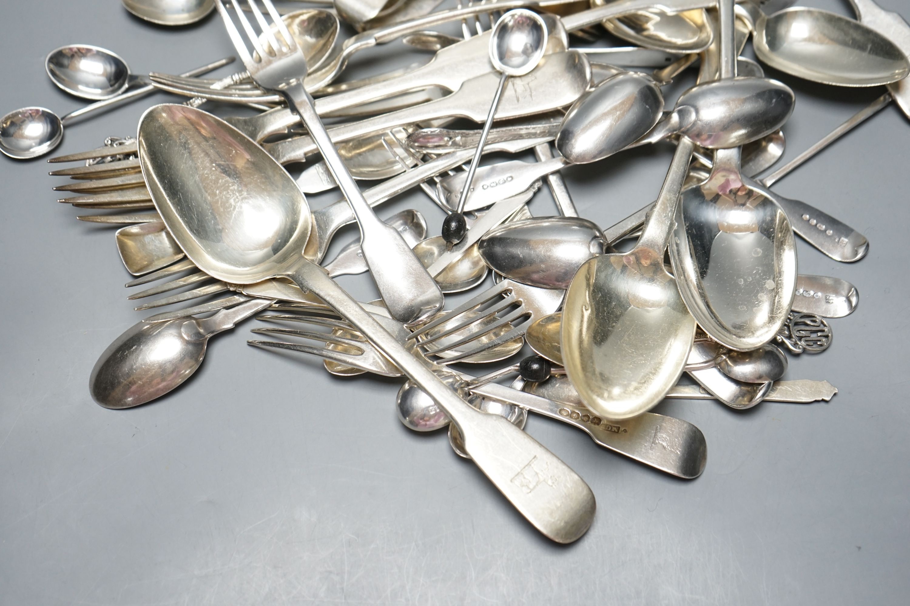 A set of six early Victorian Irish silver fiddle pattern table spoons, Philip Weekes, Dublin, 1844 and a quantity of assorted mainly 19th century flatware, various dates and makers